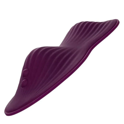 Lila silikon zervixkissen mit geriffelter struktur und zwei abgerundeten vertiefungen von calexotics dual rider fernbedienung