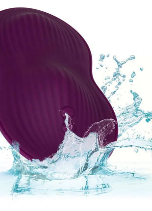 Tiefviolettes, geripptes silikonspielzeug mit ergonomischem design von calexotics dual rider fernbedienung
