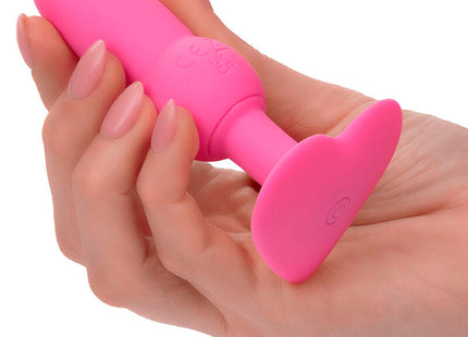 Ein lebhaftes rosa silikon-analkugel mit glatter textur und abgerundetem kopf von calexotics