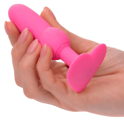 Ein lebhaftes rosa silikon-analkugel mit glatter textur und abgerundetem kopf von calexotics