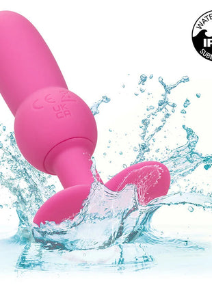 Pink silikon analplug mit rundem kopf texturierter basis und ipx7 wasserdicht von calexotics mit 10 vibrationen