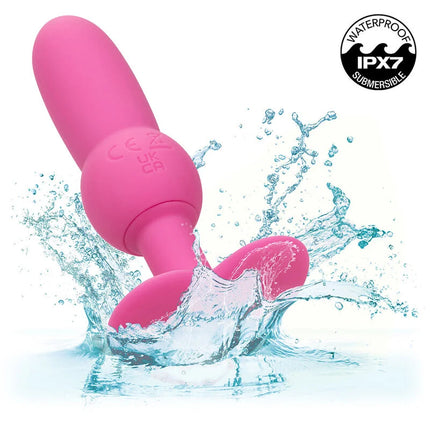 Pink silikon analplug mit rundem kopf texturierter basis und ipx7 wasserdicht von calexotics mit 10 vibrationen