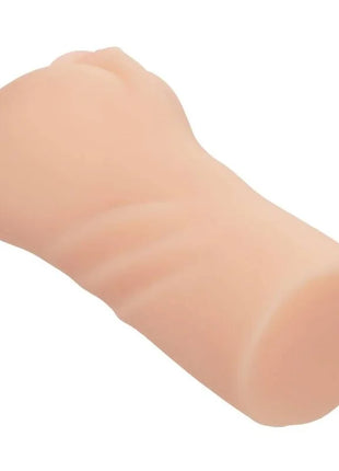 Ein pfirsichfarbener, texturierter silikon-dildo mit abgerundeten enden aus dem produkt calexotics günstige genießungen zum ersten mal