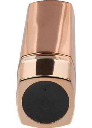 Calexotics hide & play lippenstift recharge lila in rosegold metallic mit schwarzem runden powerknopf am unteren ende