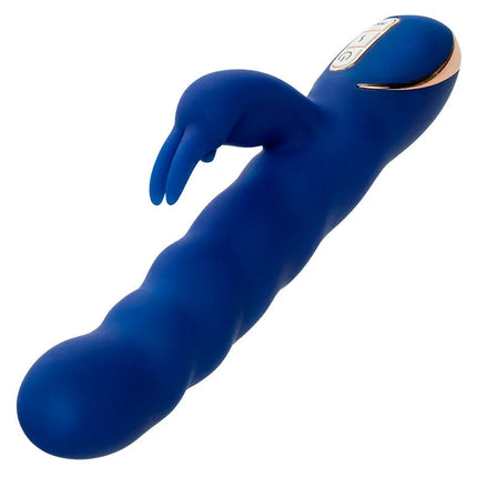 Blauer silikon jack rabbit vibrator von calexotics mit goldfarbenen steuerungstasten und wellenbewegung