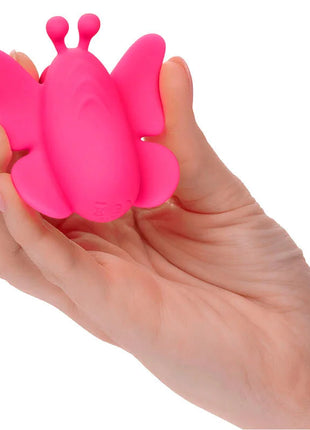 Ein lebhaftes rosa silikon schmetterlingsspielzeug mit zwei antennen der calexotics neon vibes der flutter vibe stimulator mit 10 vibrationen