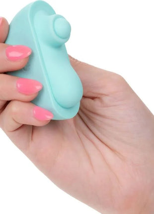 Ein mintgrüner, silikon stressball mit ergonomischem design und kleiner taste oben von CalExotics Ovation Acclaim Stimulator