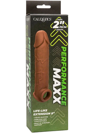 Calexotics performance maxx lebensnahe extension braune haut mit braunem liquid silikon im grün schwarzen packaging