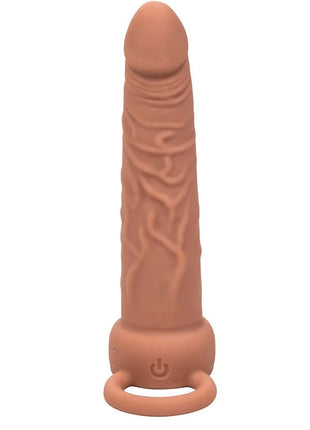 Tan-farbener silikon-dual-penetrator mit texturierten rankenmustern und power-taste am boden von calexotics