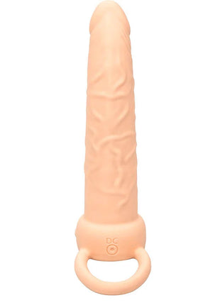 Peachfarbener silikon dildo mit strukturierter oberfläche und griffschlaufe im basisbereich von calexotics performance maxx wiederaufladbarer dual penetrierer helle haut