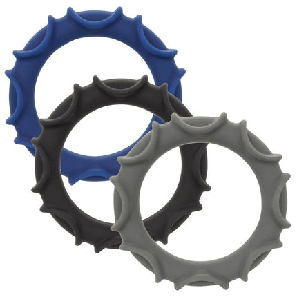 Set aus drei silikonringen in blau schwarz und grau mit zahnradähnlicher struktur calexotics pro stroker optimale power