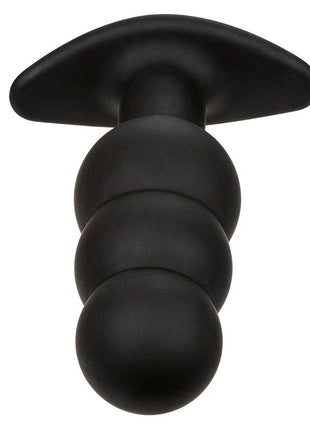 Schwarzer silikon analplug von calexotics mit ergonomischer basis und drei abgerundeten segmenten sichtbar von der rückseite