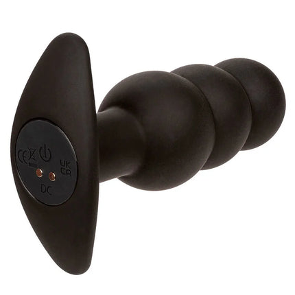 Calexotics rock bottom anal plug in schwarzem silikon mit perlen und ovalem bedienfeld mit power und lichtanzeigen