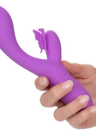 Lila silikonspielzeug mit schmetterlingsförmigem aufsatz von calexotics - schmetterling kuss flutter