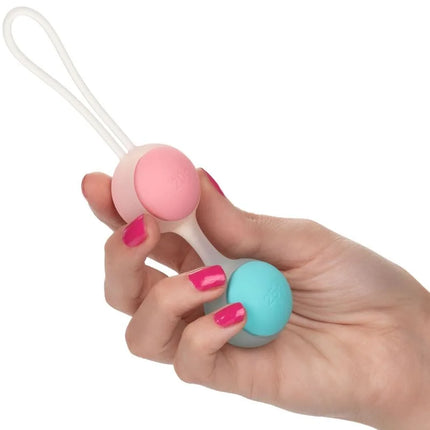 Pink und türkise silikon eierperlen mit weißem griff vom calexotics she-ology set bolas kegels austauschbar
