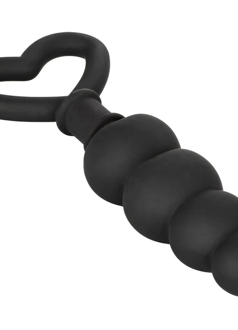 CalExotics silikon-liebesonde 11,5 cm mit schwarzem herzförmigem Griff und mattiertem, segmentiertem Silikonplug