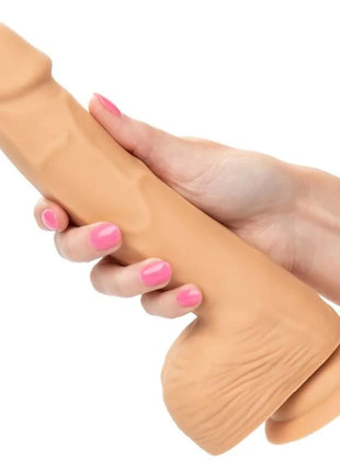 Beige silikon realistisches männliches genitalspielzeug mit strukturierter oberfläche und abgerundetem boden von calexotics