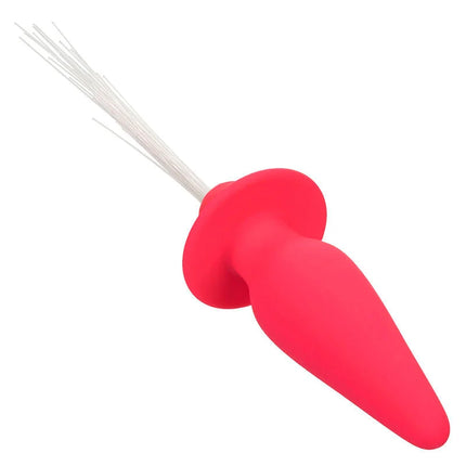 Roter silikon analplug mit weißer borstenbürste oben calexotics southern lights leuchtender analstecker rosa