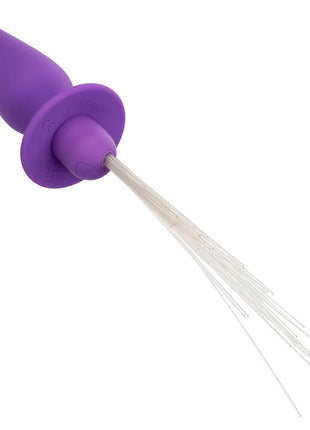 Lila silikon analstecker mit 10 vibrationen und klaren flexiblen fasersträngen am fuß von calexotics southern lights