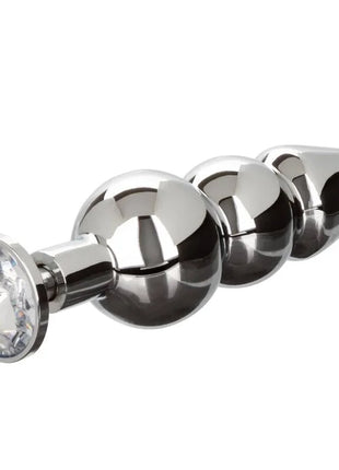 Shiny chrome-plated anal plug with faceted crystal gemstone and three spherical beads by calexotics star fucker perlenstecker