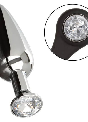 Shiny chrome-plated anal plug with black silicone base and two clear faceted crystals from calexotics star fucker slim plug