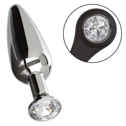 Shiny chrome-plated anal plug with black silicone base and two clear faceted crystals from calexotics star fucker slim plug