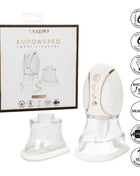 Weiß und roségold silikon sauggerät mit klarem boden marke calextics als empowered queen im produkt strkt die smarte vergnügenkönigin