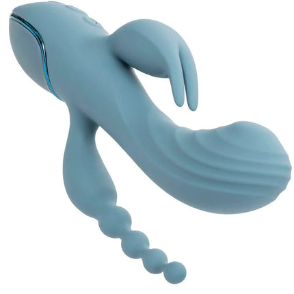 Ein leichter blauer Silikonvibrator in Delfinform mit segmentiertem Schwanz und leuchtender Kante von CalExotics