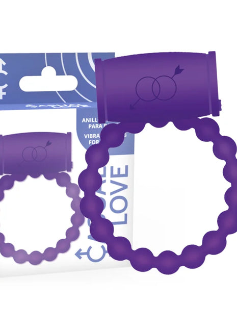 Lila silikonring mit strukturierter perlenoptik und rechteckigem steuergerät mit stilisiertem pfeilsymbol von casual love