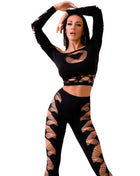 Schwarzes chilling rose zweiteiliges set mit langen ärmeln und ausgefallenen cut-out-mustern aus elastischem material