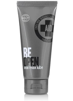 Graue tube cobeco velvor be open anal relax lube 90ml mit schwarzem kreuzlogo und weißer fetter schrift
