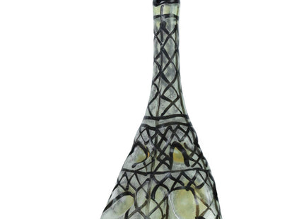 Ein klarer glasflasche mit schwarzem deckel und eiffelturm aus schwarzem gitterdesign für condomerie handbemalte neuheitskondome eiffelturm xl