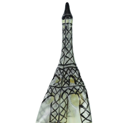 Ein klarer glasflasche mit schwarzem deckel und eiffelturm aus schwarzem gitterdesign für condomerie handbemalte neuheitskondome eiffelturm xl
