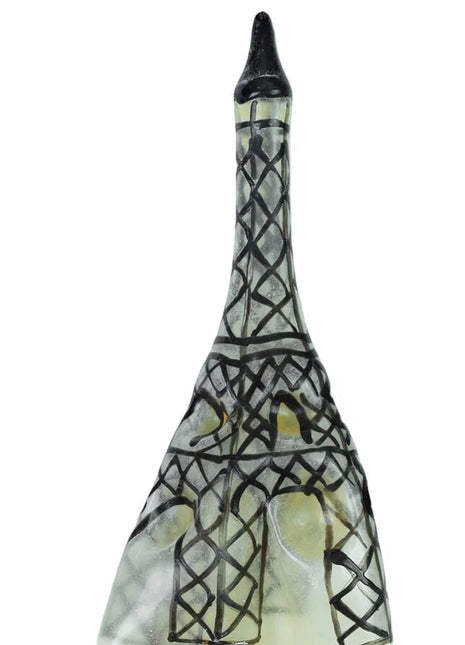 Ein klarer glasflasche mit schwarzem deckel und eiffelturm aus schwarzem gitterdesign für condomerie handbemalte neuheitskondome eiffelturm xl