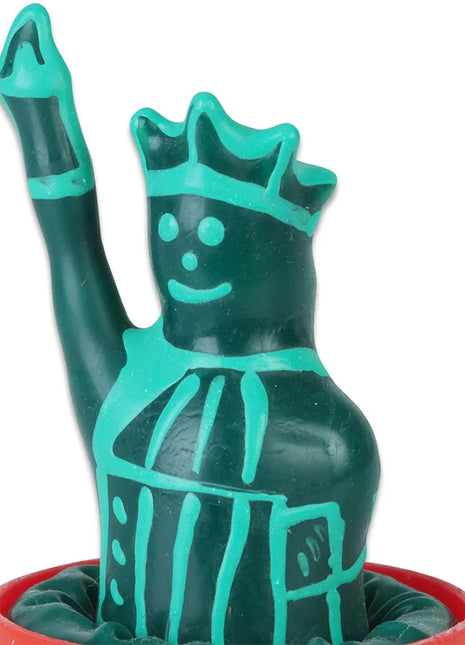 Handbemalte teal und dunkelgrüne plast figurine einer gekrönten freiheitsstatue mit erhobenem arm kondommodell