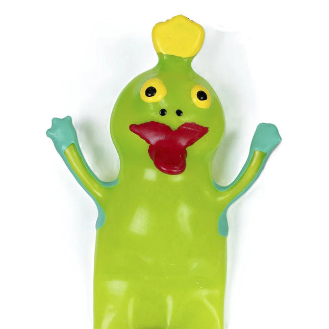 Limegrüne gummifigur mit gelber haartolle schwarzen augen roten lippen und türkisfarbenen armen handbemalt kondom