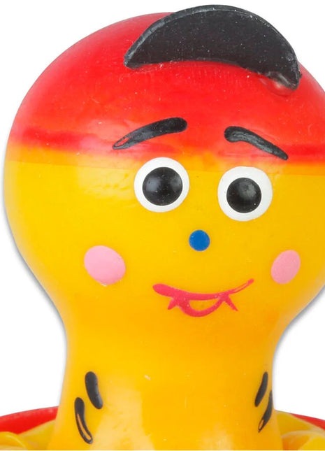 Ein fröhlicher runder plastikspielzeugfigurenkopf mit rot gelb verlaufendem gesicht für condomerie handbemalte neuheitskondome für jungen