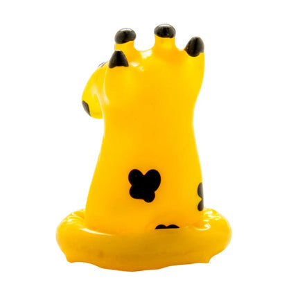 Handbemaltes giraffenförmiges kondom in gelb mit schwarzen punkten von CONDOMERIE als novelty produkt