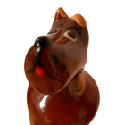 Braune keramik hundefigur mit glänzender oberfläche orange ohren und nase schwarze augen und markierungen kondomerie handbemalte neuheitskondome großer dänischer hund