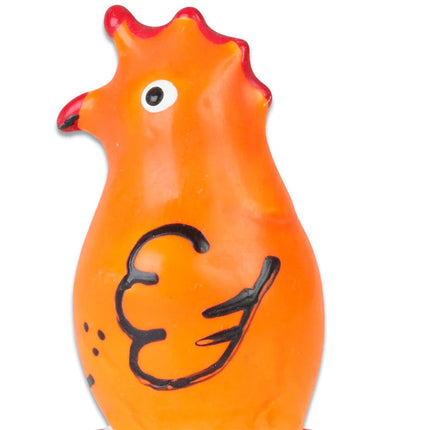 Vibrante orange keramikhahnfigur mit roten akzenten bei schnabel und kamm, handbemalt, schwarz konturierte flügel und punkte als füße
