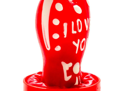 Rote plastik kerze in zahnform mit weißem ich liebe dich text und punkten aus der condomerie handbemalte neuheitskondome serie