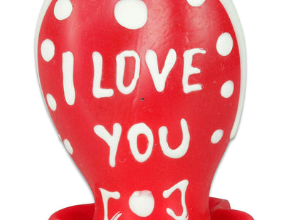 Rote herzförmige kerze mit weißen punkten und i love you in weißer glasur von condomerie handbemalt