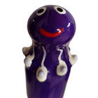 Lila keramische handbemalte kondomfigur mit glänzendem finish und weißem tropfenmuster von condomerie