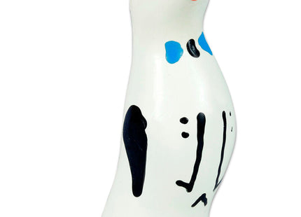 Weißes keramik-pinguinfigürchen mit schwarz-blauen bemalten markierungen und oranger schnabel von CONDOMERIE