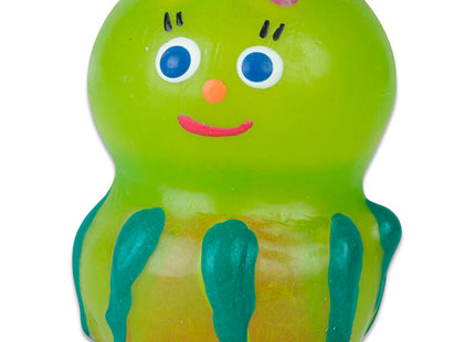 Eine fröhliche limettengrüne kunststoffspielzeug-octopus mit lila punkten blauäugig orangener nase und teal-fühlern aus der condomerie handbemalte neuheitskondome quallen serie