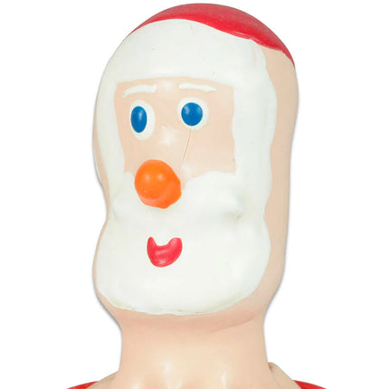 Ein fröhliches santa claus gesicht aus geformtem kunststoff mit weißem bart rotem hutbesatz blauen augen oranger nase und roten lippen für condomerie handbemalte neuheitskondome santa