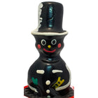 Schwarze glossy schornsteinfeger schneemann figur mit hoher zylinderhut roten backen gelber nase und weißen knöpfen