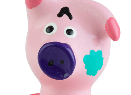 Pink handbemalte kondomfigur in form eines schweinekopfs mit lila schnauze schwarzen augen und teurem blattzeichen