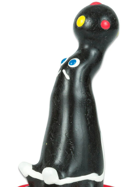 Schwarze plastikfigur mit bunten kreisaugen und weißen akzenten zum condomerie handbemalte neuheitskondome seelöwe