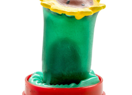 Grüner plastik sonnenblumen play-doh form mit gelber kronenblüte und braunem mittelpunkt auf rotem sockel für handbemalte condoms